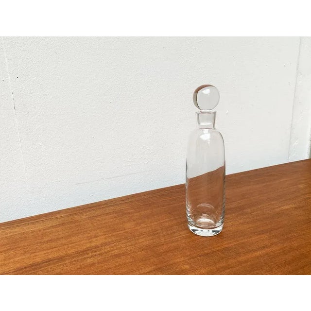 Vintage German Glass Carafe from Peill & Putzler, 1970s, in Very Good conditions. Designed 1970 to 1979 This piece has an...