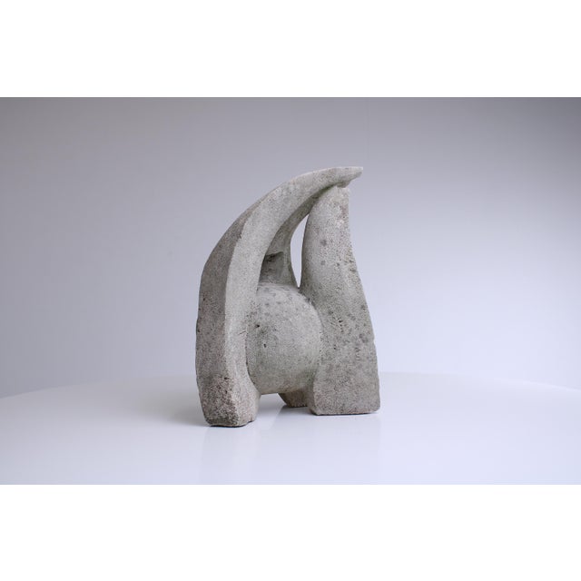 Captivating midcentury biomorphic sculpture, seamlessly blending organic forms with abstract design. The handcrafted...
