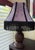 Make a dramatic statement with this stunning vintage-style lamp shade featuring luxurious purple velvet with an elegant...