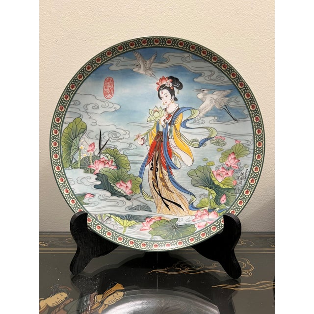 This oriental plate is The Lotus Goddess, plate one in The Flower Goddesses of China series from Imperial Ching-te Chen...