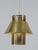 Rare, lovely and highly decorative mid-century modern brass pendant lamp or hanging light. Model t766. Designed by hans-...
