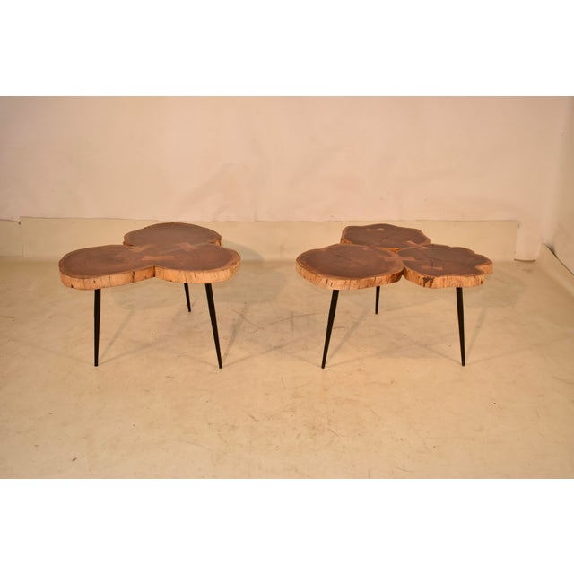 Pair of 20th century live edge Acacia wood coffee or side tables that can be used in tandem to form one large coffee table...