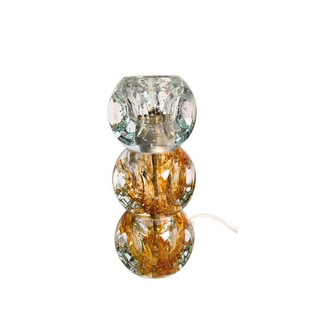 This Poliarte Murano glass table lamp, dating back to the 1970s, is a perfect example of vintage Italian design. This...