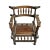 Vintage African ceremonial chief’s chair crafted from richly patinated hardwood with hand-carved spindle details,...