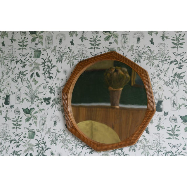 Enhance your space with our stylish Round Mirror. The unique octagonal shape, framed with high-quality pencil reed...