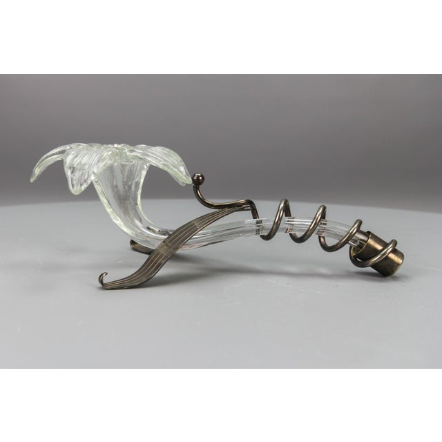 Italian Mid-Century Clear Murano Glass and Metal Vase Amaryllis, circa the 1970s. An Italian Mid-century clear Murano...