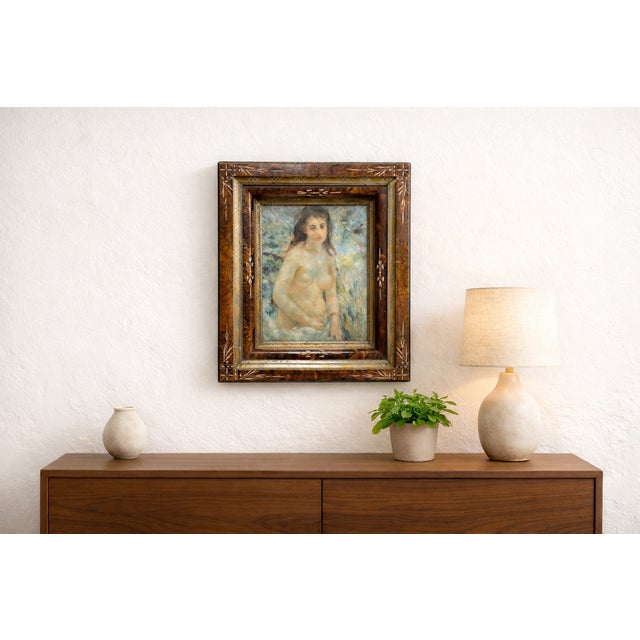 Vintage framed Renoir reproduction of Nude Female in stylized wooden frame. Ready to hang with wire along the back. Free...