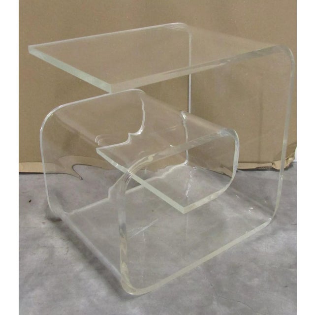 1960's Postmodern Lucite Curved Wave Side Table Measures 21" long, 15 1/4" wide and 20 3/4" tall.