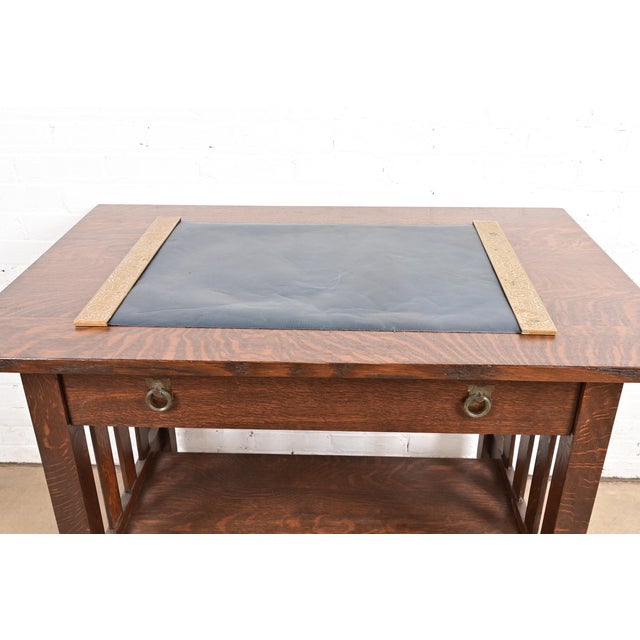 A gorgeous pair of antique Art Deco or Arts & Crafts period gilt bronze blotter ends featuring symbols of the Zodiac with...