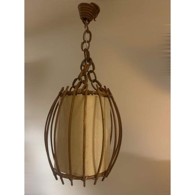 Louis Sognot was a French designer renowned for his elegant furniture combining rattan and wood. Influenced by Art Deco...
