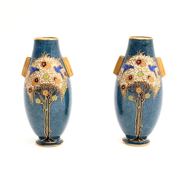 A stunning and highly collectable pair of antique Art Nouveau Royal Worcester vases. They were made in England, and date...