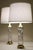 A brilliant and striking pair of slender Hollywood Regency column styled thick deep cut crystal glass & polished Brass...
