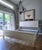 This fresh take on the traditional sleigh bed is made by Ethan Allen. It features a scaled-down footboard that gives your...