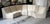 Modular beige sofa composed of 7 elements: 3 straight elements and 4 triangular elements. The elements have been...
