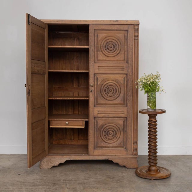 Incredible carved wood cabinet by Charles Dudouyt from France, 1940s. Beautiful carved wood circle and square detail on...