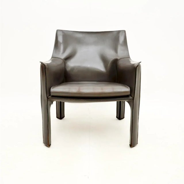 A stylish and iconic vintage Italian leather CAB armchair by Mario Bellini. This was made in Italy by Cassina, it dates...