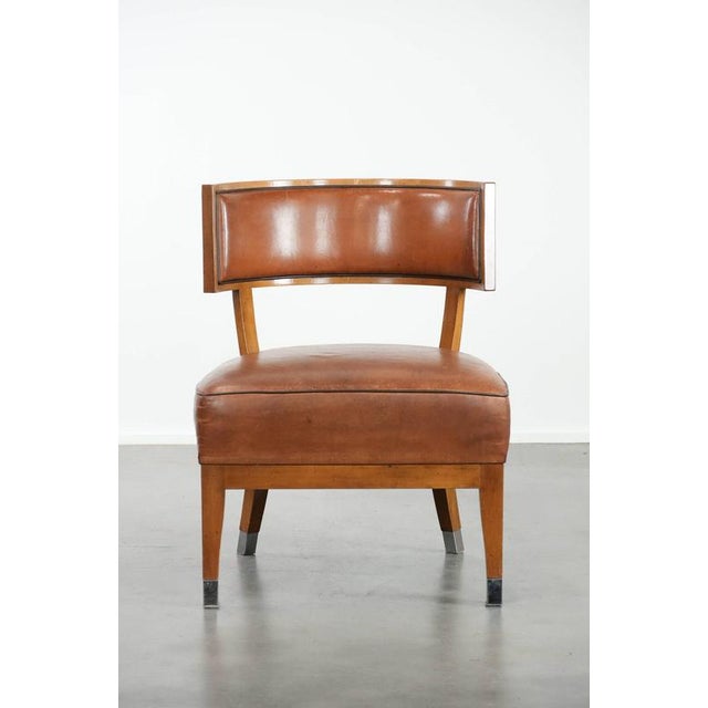 For sale by Thijs is this fantastic and charming vintage designer armchair/cocktail chair made of sheepskin with a unique...