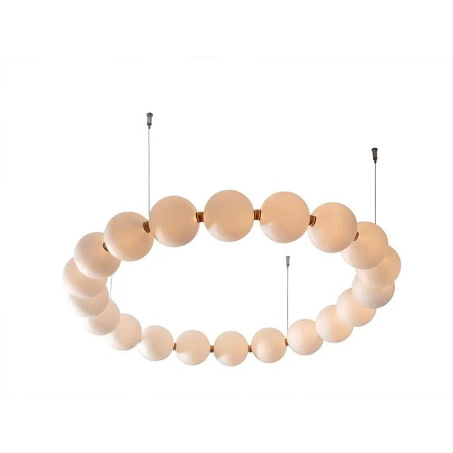 Ronde de perles chandelier by ludovic clément d’armont dimensions: d95 x w95 x h12 cm materials: blown glass, brass,leds...