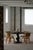 Elegant Danish art deco dining table crafted in solid oak with a rich ebonized finish. The round tabletop is accented by a...