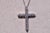 The Cantaron: White Gold Cross Necklace with Natural Diamonds. The cross features round brilliant cut natural diamonds...