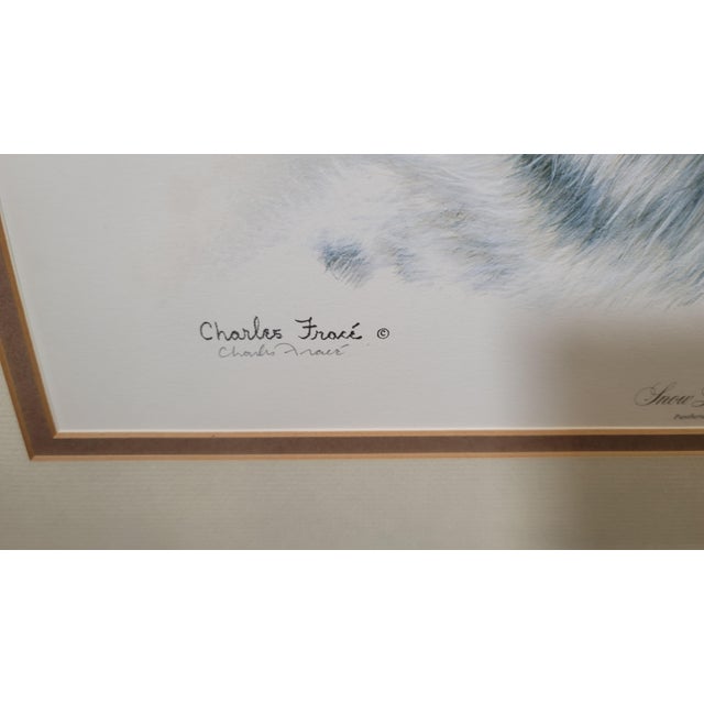 A Signed print of the original oil painting by Charles Frace of "Snow Leopard" from 1980. Comes with original mounting and...