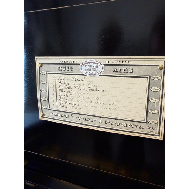 An exceptional antique Swiss cylinder music box dating to the late 19th century, housed in a beautifully crafted...