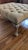 Custom Century furniture tufted large ottoman with claw feet and antique nail head detail. Pristine condition...