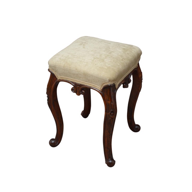 A fine and elegant Victorian dressing table or piano stool, circa 1860. Crafted from beautifully figured Goncalo Alves, it...