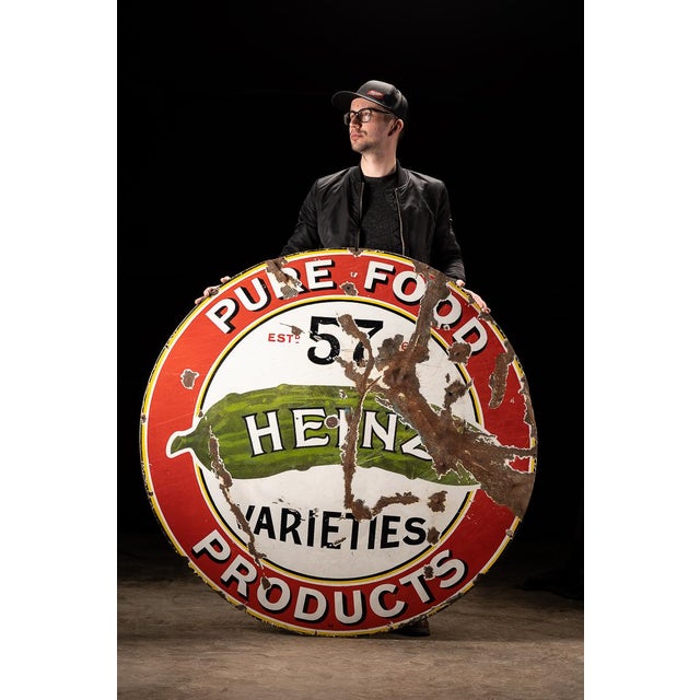 Large circular single-sided porcelain advertising sign for the H.J. Heinz Company of Pittsburgh. Dating to approximately...