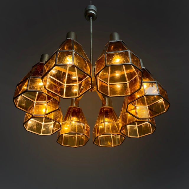 German Art Deco chandelier in yellow glass and metal, 1930s Chandelier with eight yellow glass shades with a metal finish....