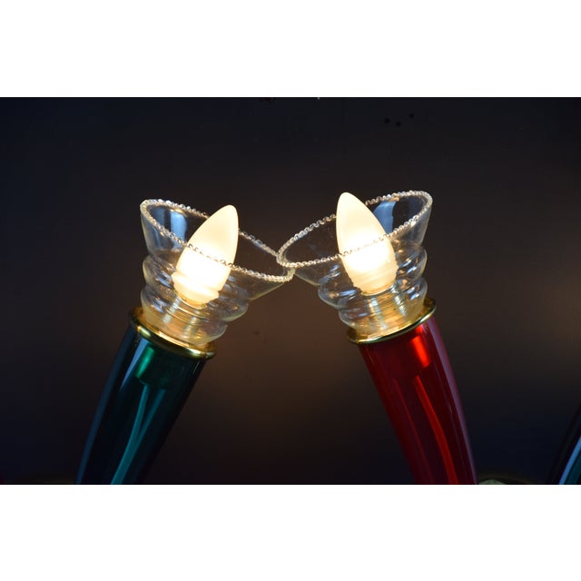 Elevate your space with a touch of Italian elegance through these rare Ducale hand-blown Murano glass sconces, a stunning...