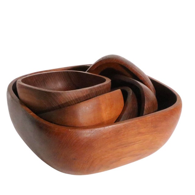 Classic Mid Century teak salad set, made in Thailand by Good Wood. The set consists of six smaller individual salad bowls...