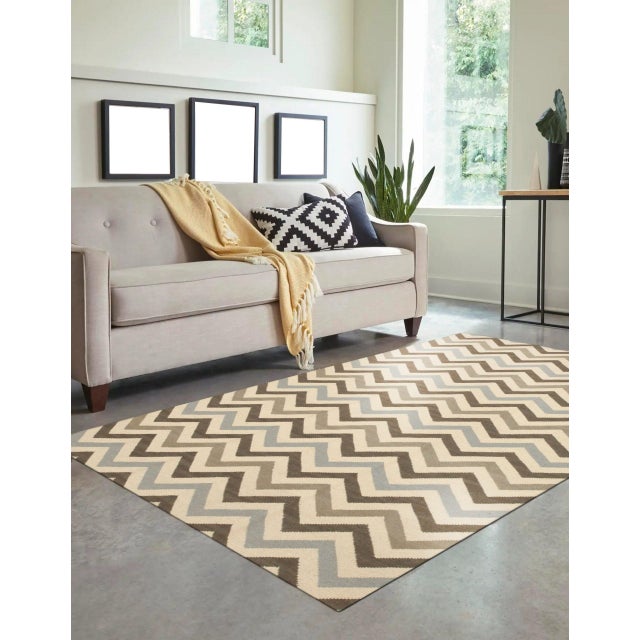 Handcrafted Lush Multicolor Flatweave Wool Rug, Country of Origin: India. This contemporary flatweave offers a striking,...