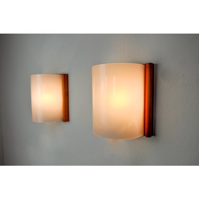 Superb pair of Mediterranean sconces, designated and produced in Spain in the 1980s. They are composed of a pine and...
