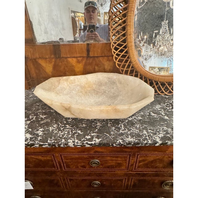 The Large South American Rock Crystal Bowl is a stunning accessory that adds a touch of elegance to any home. Made with...