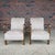 Beautiful pair of European modern lounge chairs newly refinished and professionally reupholstered. These chairs feature...