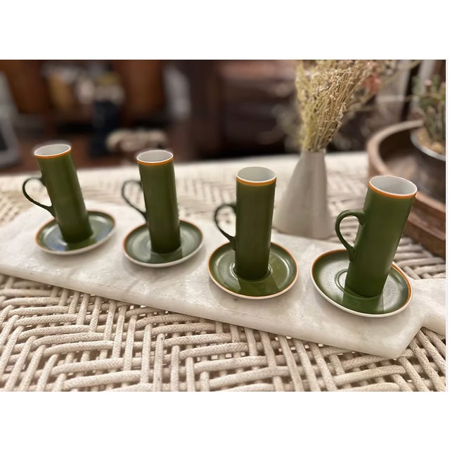 This rare vintage set of 4 Tackett Schmid porcelain espresso cups with saucers from the 1960s exudes mid-century modern...