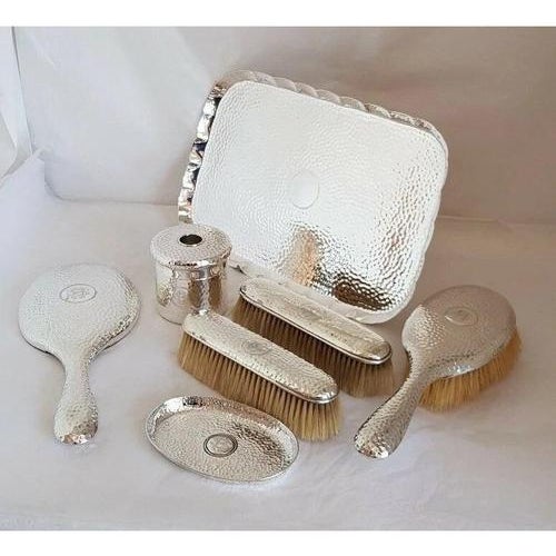 A fine and extensive edwardian sterling silver dressing table vanity set, principally hallmarked london 1900–1901 and made...
