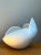 This vintage sculptural bowl is crafted from white ceramic and captures the fluid, organic lines associated with Mid-...