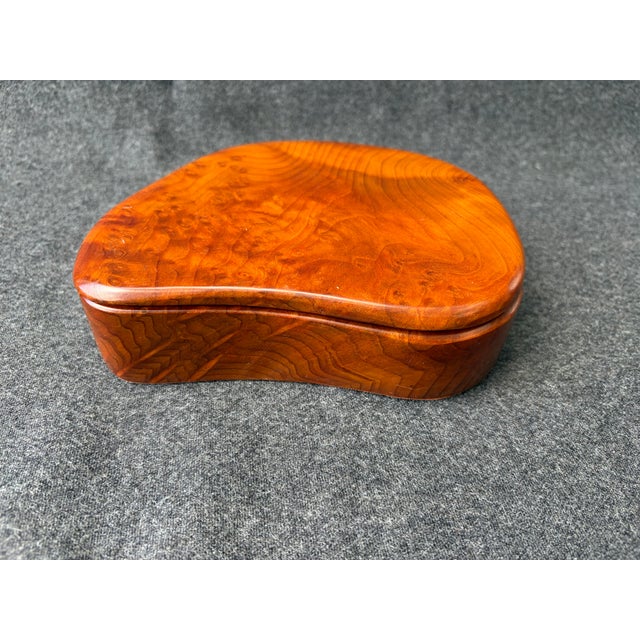 Richly colored, vintage, free form California redwood decorative lidded box. The base of the box and inside compartment...