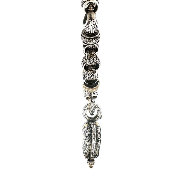 Late 20th-century Bowman Original intricate link, reversible heart necklace crafted in the United States. The piece...