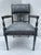 A single vintage carved wood French style fauteuil armchair with upholsteeed seat, back, and arms. The carved wood frame...