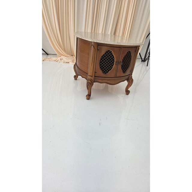 This Vintage French Provincial Drum Table is a unique and stylish addition to any room in your home. Made in Italy with...