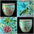This magnificent hand-painted fishbowl jardinièrre is a true showstopper that brings timeless elegance and vibrant color...