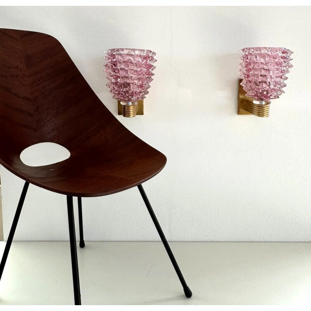 Beautiful set of two gorgeous heavy wall lamps entirely hand-crafted in Murano made of pink Murano glass in rostrato...