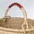 Description These natural grass Hampers are tightly woven by expert weavers in Ghana and feature brown leather-wrapped...