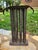 This antique primitive tin candle mold, dating back to the 18th and 19th centuries, was used by threading a cotton wick...