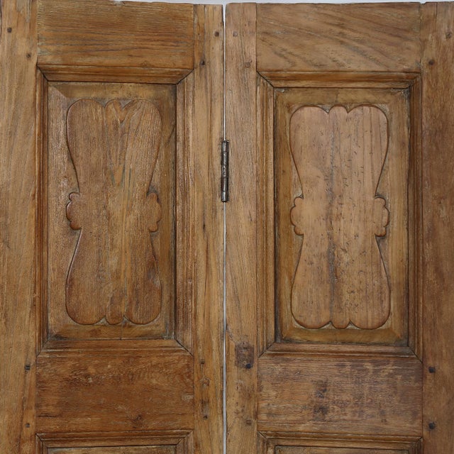 Vintage Indian Teakwood 3 Panel Screen, in a rich natural teak color, each leaf with 3 shaped panels. 1st half of the 20th...