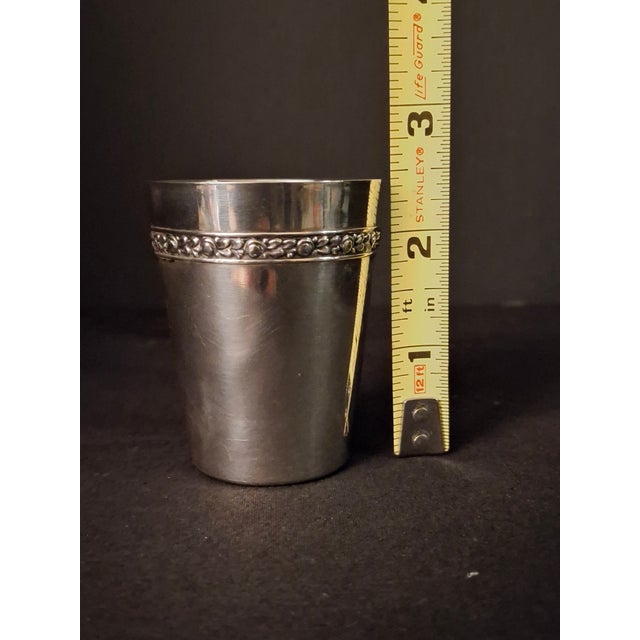 An exquisite mid-20th-century German .800 solid silver beaker or miniature Kiddush cup crafted by the renowned silver...