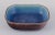 Eva Stæhr-Nielsen (1911-1976) for Saxbo, Denmark. Large rectangular ceramic bowl. Hand-glazed in brown, blue, and green...